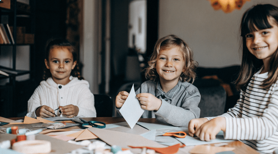 Benefits of Crafting with Kids Children enjoying a crafting session together.
