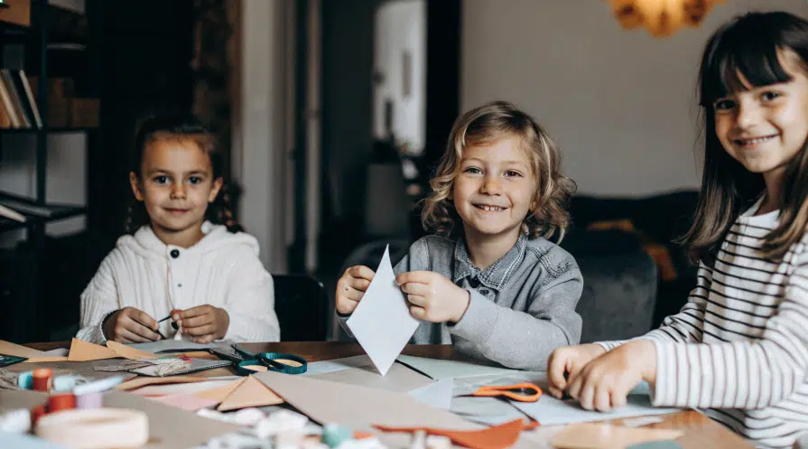 Children enjoying a crafting session together.
