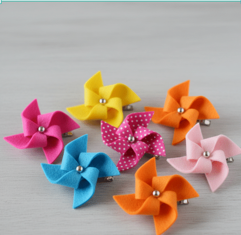 Pinwheel Hair Clip Tutorial Step-by-step tutorial for making pinwheel hair clips.