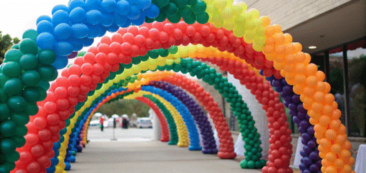 Balloon Arch Design Different colored balloon arches outdoor.