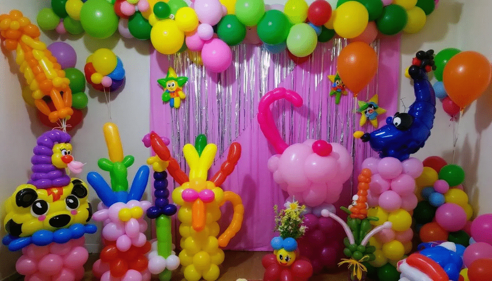 DIY Balloon Decorations The image features a vibrant display of DIY balloon decorations, including a colorful balloon garland and playful balloon sculptures shaped like animals and hats. These festive decorations are perfect for a birthday party, adding a cheerful touch to the home with various balloon colors and sizes.
