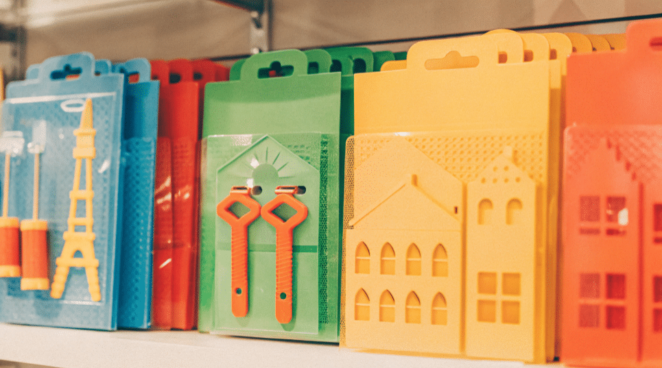 The image showcases a variety of DIY kits designed for both kids and adults, featuring colorful packaging and an assortment of materials for crafting, building, and learning. Each kit includes instructions and tools tailored to different skill levels, encouraging creativity and hands-on engagement for all ages.