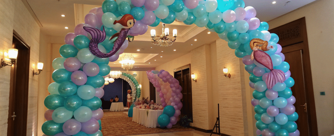 A Mermaid Balloons Arch in a hallway.