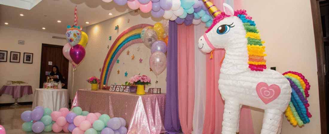 A room full of balloons and unicorn for a party.