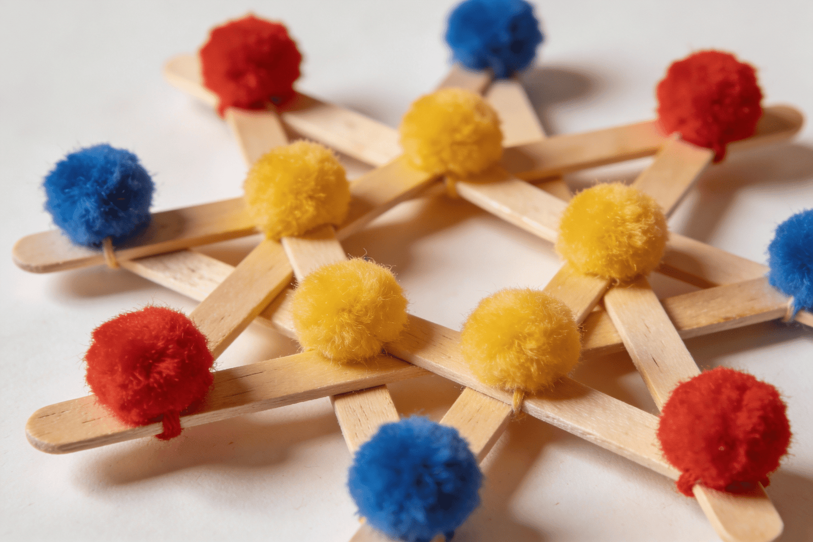 Crafts with Pom Poms and Popsicle Sticks