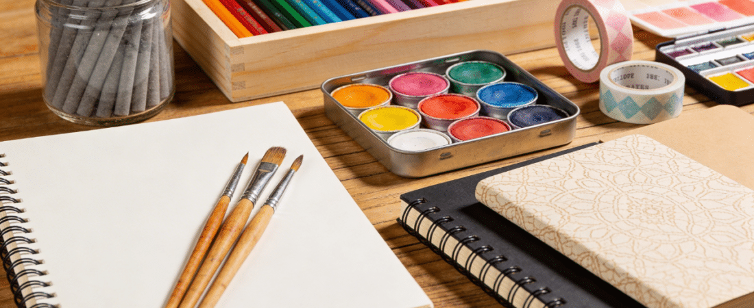 Art and crafts on a table.