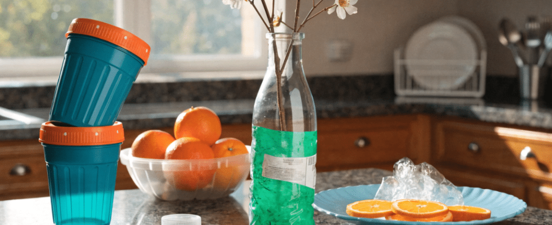 Things to Make from Trash Bottle crafts on a table.